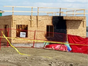 Burn marks from a vehicle fire mar the wall of a house under construction in northwestern Calgary on Monday, July 10, 2017. The Calgary police homicide unit is investigating after three bodies were found Monday in a burned-out vehicle at a construction site on the city's northwestern edge. THE CANADIAN PRESS/Lauren Krugel ORG XMIT: LAK103
Lauren Krugel,