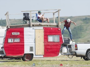 Some people continue to lounge while queueing to leave the Country Thunder festival campgrounds.