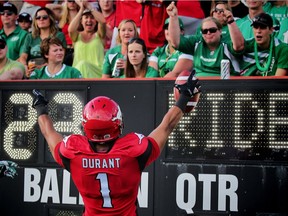 The Calgary Stampeders' Lemar Durant celebrates an easy touchdown Saturday against the visiting Saskatchewan Roughriders.