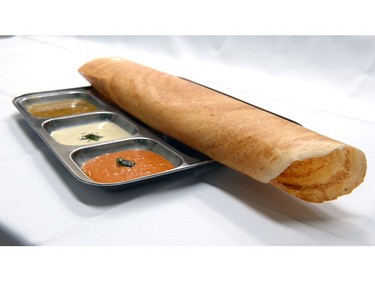 Masala dosa served with three different sauces.