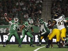 The Saskatchewan Roughriders' ability to protect quarterback Kevin Glenn, left, is a major reason for the team's offensive success so far this season.