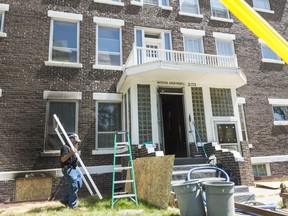 A restoration crew was out working on Modern Apartments at 2175 Robinson St. The building was damaged by fire last Sunday.