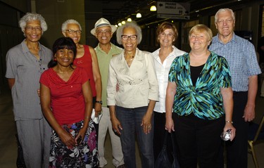 REGINA, SASK - August 28, 2014  -  Friends and family of Carol Lafayette-Boyd pose at the Regina Sports Hall of Fame area in the Co-operators Centre in Regina, Sask. on Thursday Aug. 28, 2014. (Michael Bell/Regina Leader-Post) QC OTS