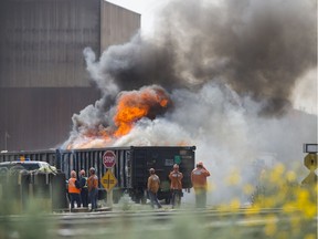 A rail car burns near EVRAZ off Armour Road.