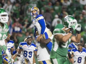 Winnipeg Blue Bombers' Justin Medlock celebrates a game-winning field goal on Saturday.