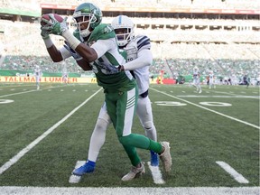 The Saskatchewan Roughriders' Duron Carter, shown making a tough catch last weekend against the Toronto Argos, is not in favour of the CFL's decision to reduce video review challenges.