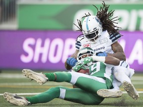 The Saskatchewan Roughriders' Duron Carter catches a touchdown pass Saturday against the Toronto Argonauts' Johnny Sears Jr. Carter had a big game. Sears? Not so much.