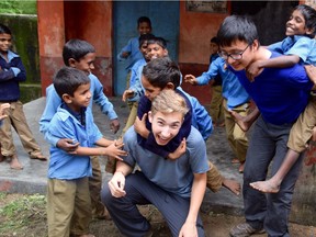 Jonah Toth, seen here giving piggy back rides to children during a volunteer trip to India, will receive the Regina Young Humanitarian of the Year Award at the 9th annual Power of Humanity Gala in Regina, Thursday, Oct. 26, 2017.