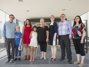 (From left) Ian Jensen, Noah Jensen, Krista Forsberg, Renn Forsberg, Fran Forsberg, Megan Cheesbrough, Dustin Dyck and Christine Dyck are advocating to have gender markers removed from government-issued ID.