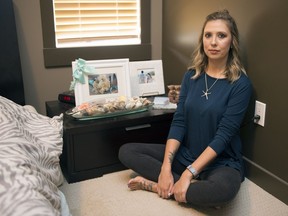 REGINA, SASK :  July 25, 2017  --  Kristin Vogel sits in her house where the urn which kept her mother, Rhonda Ermel, ashes in was stolen during a break and enter in Regina. TROY FLEECE / Regina Leader-Post
TROY FLEECE, Regina Leader-Post