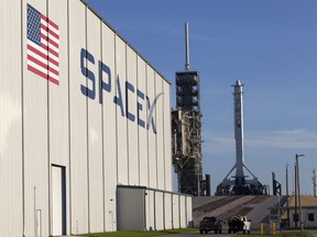 In this photo provided by NASA, a SpaceX Falcon 9 rocket and Dragon spacecraft await liftoff from NASA Kennedy Space Centers Launch Complex 39A in Cape Canaveral, Fla., on Monday, Aug. 14, 2017. SpaceX is about to launch a few tons of research to the International Space Station  plus ice cream.