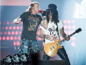Axl Rose (left) and Slash of Guns N' Roses, shown performing recently in Denmark, rocked Regina's Mosaic Stadium on Aug. 27.