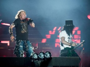 Axl Rose (lft), lead singer of the Guns N' Roses, performs with Slash at Parken Stadium, Copenhagen, Denmark on June 27. GNR will play Mosaic Stadium on Aug. 27.