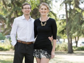 Iain Fyfe, left, and his girlfriend Mallory McCormick pose for a portrait in Victoria Park in Regina.  Mallory saved Iain's life by performing CPR on Iain about two months ago when he woke in the middle of the night in heart failure and having trouble breathing.