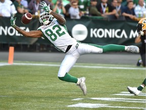 Naaman Roosevelt makes a spectacular touchdown catch for the Roughriders during Friday's first quarter in Edmonton.