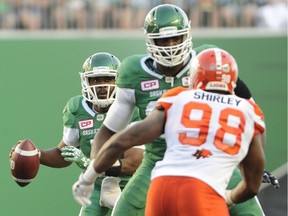 The Roughriders need to protect quarterback Kevin Glenn, left, as they did effectively during the B.C. Lions on Aug. 13.