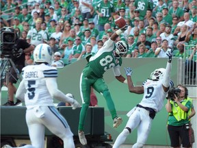 The Saskatchewan Roughriders' Duron Carter makes a one-handed touchdown catch against the Toronto Argonauts on July 29.