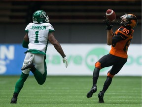 Saskatchewan's Jovon Johnson, 1, was beaten for a 49-yard gain by the B.C. Lions' Chris Williams on Saturday in Vancouver.