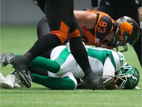 The B.C. Lions' Craig Roh sacks Saskatchewan Roughriders quarterback Kevin Glenn on Saturday.