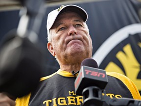 Hamilton Tiger-Cats head coach June Jones speaks to the media about the joint team and CFL decision to backtrack on the hiring of Art Briles as assistant coach following a practice in Hamilton, Ont., Tuesday, August 29, 2017.