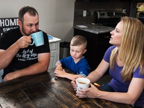 Mathieu Kelly (left) and Lesley Kelly speak about their family's experience with depression in their home in Regina, Saskatchewan on August 5, 2017.