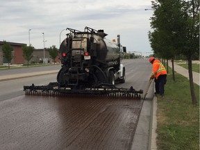 The City of Regina is piloting a new pavement preservation project that it hopes will reduce cracks and potholes while also saving money. Photo courtesy City of Regina.
Regina Leader-Post