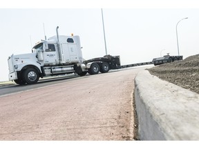 A truck takes a roundabout near the Balgonie overpass.