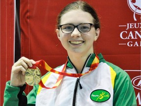 Saskatoon's Shelby Newkirk poses with one of the four gold medals she won for Saskatchewan at the 2017 Canada Summer Games.