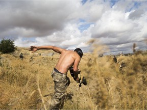 SASKATOON,SK--SEPT 17 2017-0917-SPORTS-PAINTBALL- A player on the Allied team goes to find cover during a WW2 re-enactment at Prairie Storm Paintball near Moose Jaw, SK on Sunday, September 17, 2017. (Saskatoon StarPhoenix/Kayle Neis) Kayle Neis, Saskatoon StarPhoenix