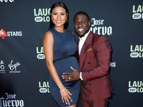 FILE - In this Aug. 3, 2017, file photo, comedian Kevin Hart and his wife Eniko Parrish pose at Kevin Hart&#039;s &ampquot;Laugh Out Loud&ampquot; new streaming video network launch event at the Goldstein Residence on in Beverly Hills, Calif. Responding to a video of him looking cozy with a brunette in the back of a car, Hart has publicly apologized in a video on Instagram on Saturday, Sept. 16, to his pregnant wife and his kids for what he described as a &ampquot;bad error in judgement.&ampquot; (Photo by Danny Moloshok/Invision/A