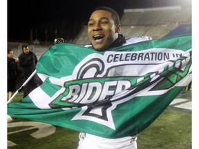 Kory Sheets celebrates the Saskatchewan Roughriders' victory over the Calgary Stampeders in the 2013 West Division final. The Roughriders have not defeated the Stampeders since then.