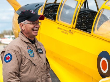 Pilot Mark Odegard of the Commonwealth Air Training Plan Museum in Brandon, Manitoba stands next to his PT-26 Cornell aircraft he flew to Regina, Saskatchewan for the Regina Flying Club's open house event on September 17, 2017.