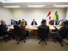 Parliamentary secretary for federal Minister of Finance, Joel Lightbound, middle, meets with small business owners in Regina as part of a cross-country listening tour focused on proposed tax changes.