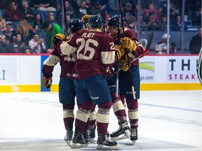 The Regina Pats celebrated a 4-3 victory over the Brandon Wheat Kings on Saturday, one night after losing 8-1 in Brandon.