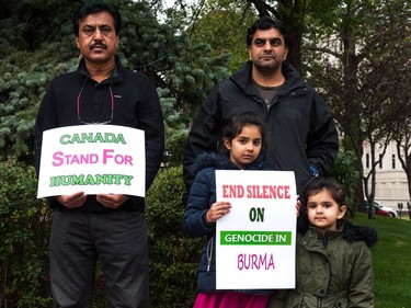 Protestors gather at city hall in Regina, Saskatchewan to rally against violence in western Myanmar. September 16, 2017.