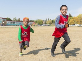 Isaac Dawn (left) and Deklan Standingready are members of the Rosemont School running club.