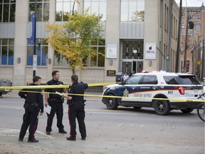 Several blocks of downtown Saskatoon, including around Fourth Avenue South, 20th Street East and Spadina Crescent, were taped off by police on Sept. 27, 2017, after an incident in which officers' weapons were drawn during a foot pursuit, according to several witnesses.