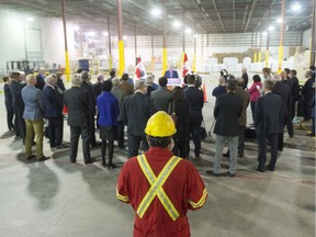 Production manager Vasif Turhan at an AGT Foods and Ingredients' cleaning and packaging facility looks on during a news conference about the federal government's Innovation Superclusters Initiative. Of 50 different proposals, the Protein Innovations Canada Supercluster, of which AGT is a part, is a shortlisted finalist.