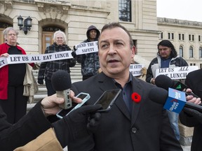 Peter Gilmer of the Regina Anti-Poverty Ministry speaks outside the Legislative Building.