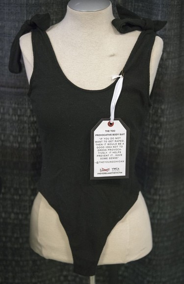 The YWCA is holding a BLAME pop-up shop at the University of Regina. Its controversial clothing display opposes blaming and shaming victims of sex assault by attaching to them quotes from judgments and tweets. This is "The Too Provocative Body Suit."