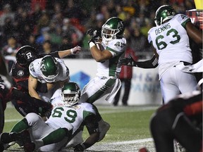 Kienan LaFrance, shown scoring a touchdown for the Saskatchewan Roughriders on Friday, made several key runs in an 18-17 victory over the host Ottawa Redblacks.