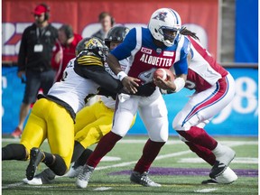 Montreal Alouettes quarterback Darian Durant is sacked by the Hamilton Tiger-Cats' Simoni Lawrence on Sunday.