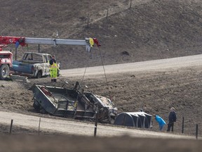A crane removes a truck from a ditch approximately 10 kms south of Burstall. RCMP confirmed that one person was killed in the accident.