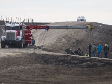 A crane removes a truck from a ditch approximately 10 kms south of Burstall. RCMP confirmed that one person was killed in the accident.