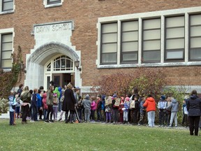 Students gather outside of Davin School in October 2017.