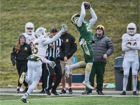 The University of Regina Rams' Polis Koko makes an interception against the University of Alberta Golden Bears on Saturday in Edmonton.