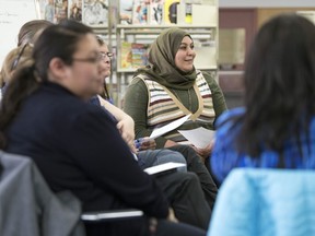 Naeila Alshatir, a newcomer from Syria, takes part in a breakout group at the South Saskatchewan Community Foundation's Vital Conversation event.