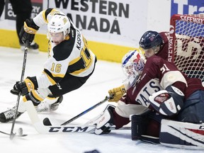 Brandon Wheat Kings forward Tanner Kaspick tries to backhand the puck past Regina Pats goalie Tyler Brown during WHL action at the Brandt Centre on Wednesday.