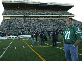 Roughriders legend Bobby Jurasin standing in front of the west-side stands, to be demolished this week.