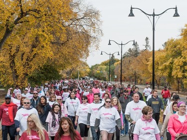 Participants in the CIBC Run For the Cure move along Hill Blvd.